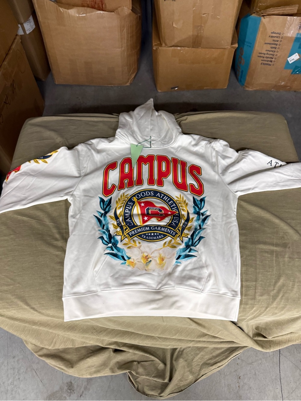 White Hoodie with Green Campus Tag and Crest
